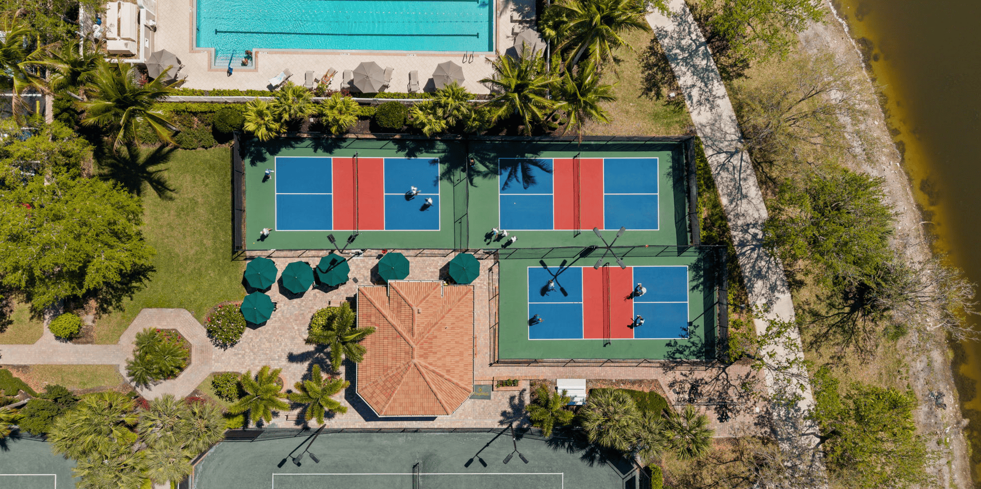 Sonja Pound & Noble Heron Group love Island Walk's racquet courts and sports amentities